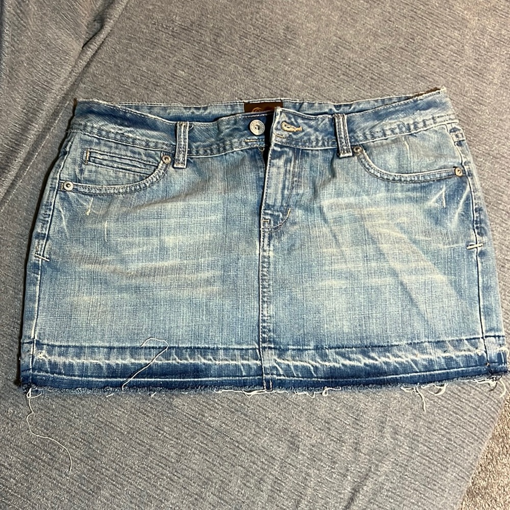Mini light blue denim skirt